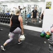 Single leg squats with kettlebells